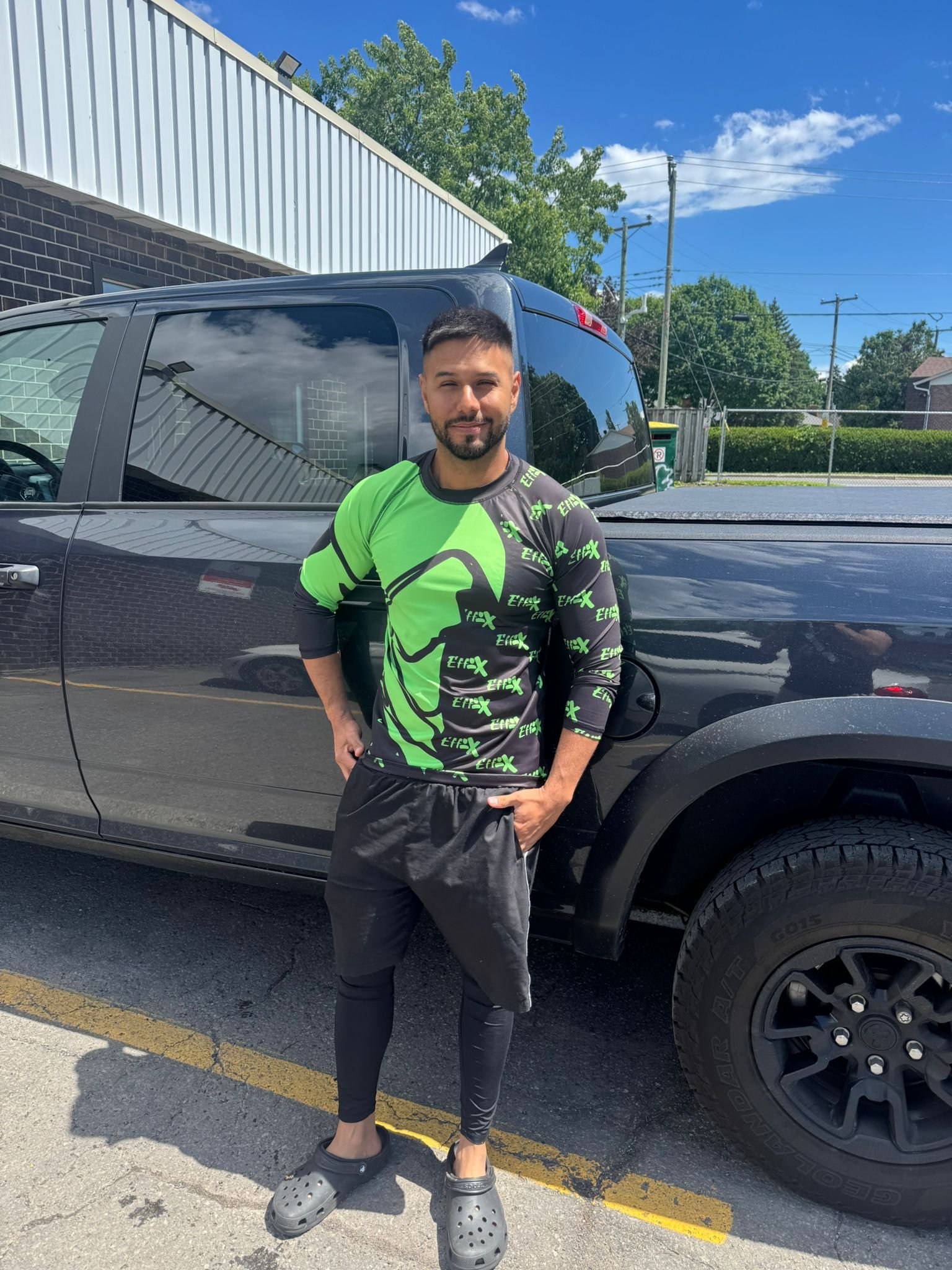 Effo-X community member wearing a green rash guard
